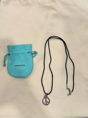 Tiffany & Co. Silver Peace Sign Pendant Necklace on Black Cord